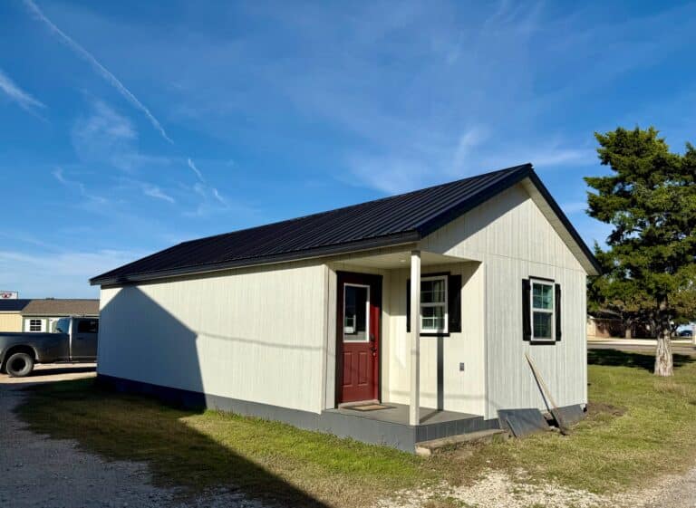 16x36 Outpost Cabin w/ Corner porch: Used