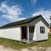 16x36 Outpost cabin office for sale Lott Texas Used Full Interior Finish (3) 16x36 Outpost: Office w/ Corner porch: Used